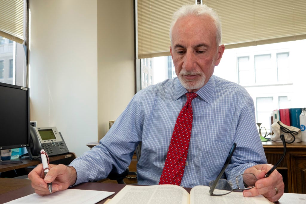 photo of attorney Rick DeBlasis at desk